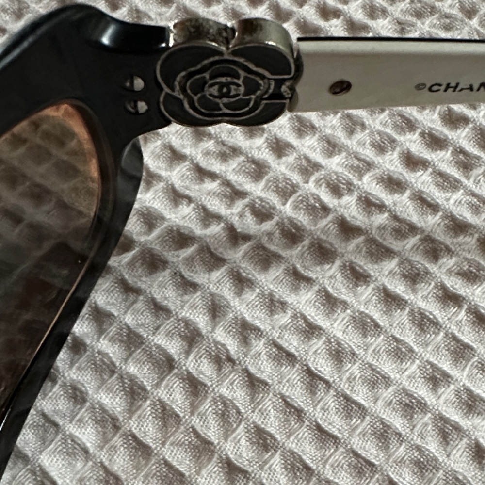 CHANEL Black and Silver Sunglasses with Floral Accent